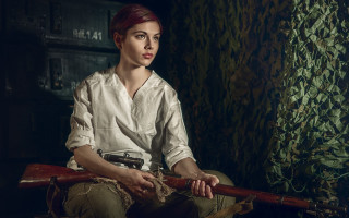 Woman gun portrait redhair serious - a chair holding free wallpaper
