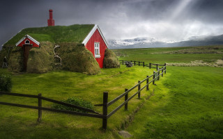 Red house green roof fence - a red house free wallpaper