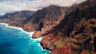 Mountain ocean plane view cliffs - scenic free wallpaper
