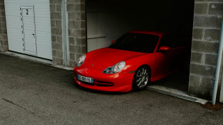 Red sports car garage tilt - a door open free wallpaper