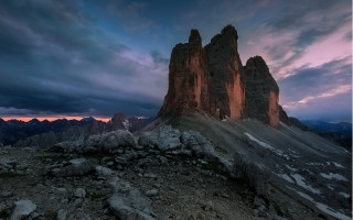 Mountain rock formation sunset cloudy - romanesque free wallpaper