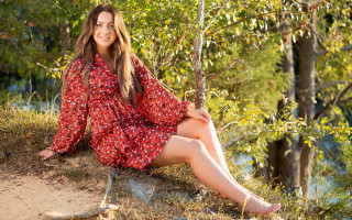 Woman red dress sitting rock - a rock free wallpaper for desktop