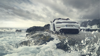 White sports car rocky shore - a gray sky free wallpaper