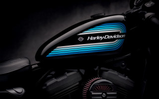 Motorcycle logo stripe black background - a close up of a motorcycle free wallpaper