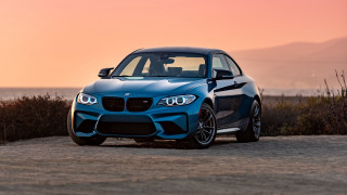 Blue car ocean dirt sunset - a blue car free wallpaper