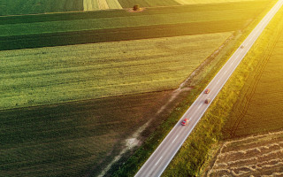 Green field road truck sunshine - a truck driving free wallpaper