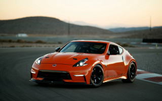 Car race track mountains sunset - a race track free wallpaper for desktop