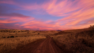 Dirt road sunset clouds hill - a hill in the distance free wallpaper