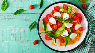 Tomatoes mozzarella basil blue table - neofauvism free wallpaper