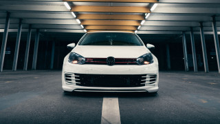White car parking garage photorealism - a yellow light free wallpaper