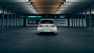 White car parking garage wild - a sign above free wallpaper