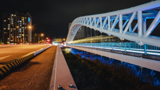 Night lit bridge cityscape holography - a street light in the background free wallpaper