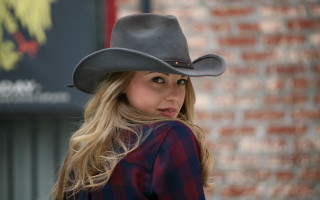 Cowgirl plaid blonde portrait blurry - a brick wall free wallpaper