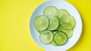 Sliced limes yellow background white - minimalism free wallpaper