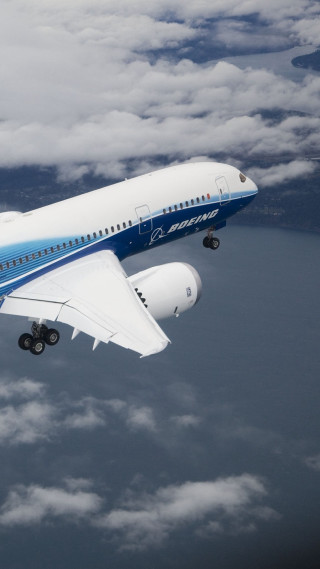 Jetliner cloudy sky blue white - free airplane wallpaper
