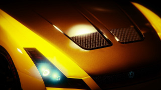 Yellow sports car lights hood - a yellow sports car free wallpaper