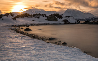Snowy mountain water rocks dusk - a snowy mountain free wallpaper