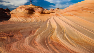 Desert rock formation sky clouds 5 - a person free wallpaper for desktop