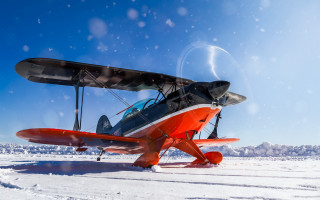 Small airplane snow field clouds - top of a snow free wallpaper