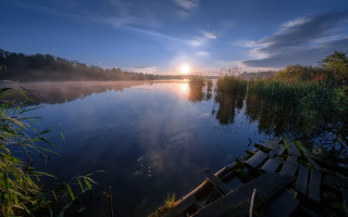 Lake dock boat sunset mountains - the distance free wallpaper