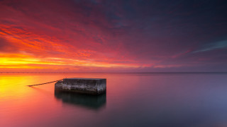 Sunset water mountain shore clouds - rich moody colour free wallpaper