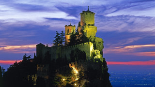 Castle tower clock night city - a purple sky free wallpaper