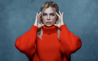 Serious woman red sweater blue - a red sweater free wallpaper
