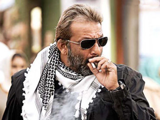 Bearded man smoking sunglasses scarf - movie still free wallpaper