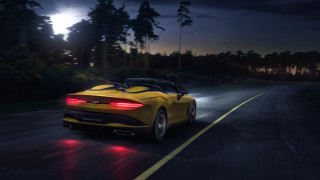 Yellow sports car night city 2 - a yellow sports car free wallpaper