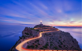 Long exposure lighthouse road night - a long exposure of light free wallpaper