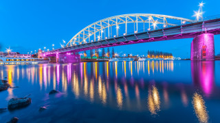 Bridge pink purple light cityscape - a bridge over a body of water free wallpaper