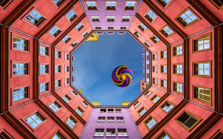 Colorful kite blue sky building - cubist free wallpaper