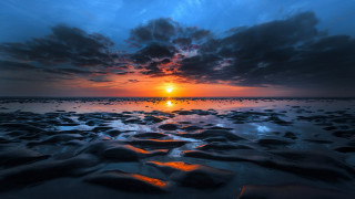 Sunset beach rocks water cloudy 3 - the sun setting free wallpaper