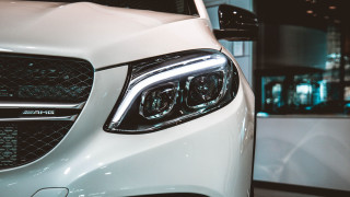 White car black grill headlights - a white car free wallpaper