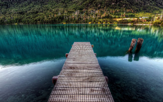 Dock mountain lake city bridge - clear blue water free wallpaper