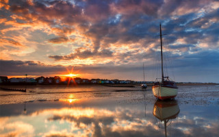 Sunset boat reflection clouds beautiful - a reflection of the sky free wallpaper