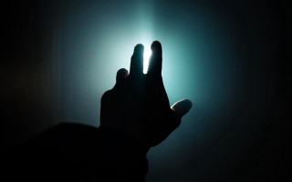 Hand raising dark light hologram - a hand free wallpaper