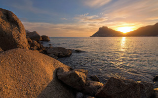 Sunset water rocks mountains orange 2 - the foreground and mountains free wallpaper