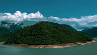 Large green hill lake mountains - top of a lake free wallpaper