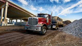 Red truck dirt road bridge - a red truck free wallpaper