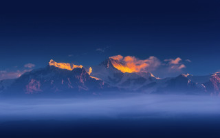 Mountain range clouds orange sky - a mountain range free wallpaper