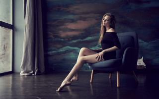 Woman sitting chair cloud cat - the floor in a room free wallpaper