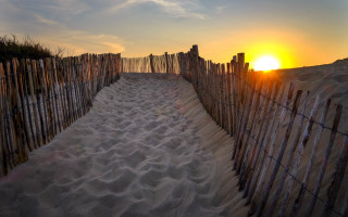 Beach fence sunset sand dunes - depth of field free wallpaper