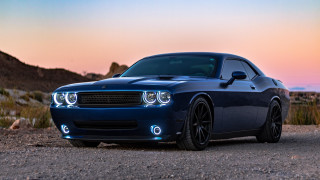 Blue car sunset mountains rim - a dirt road free wallpaper