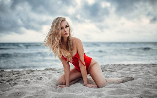 Woman beach redbikini ocean clouds - a red bikini free wallpaper