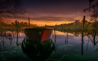 Boat sunset fish water magic - the water below free wallpaper