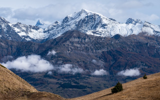 Mountain range trees clouds snow - a mountain range free wallpaper