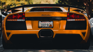 Yellow sports car parked license - dr. atl free wallpaper