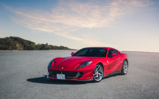 Red sports car road hill - bernardo cavallino free wallpaper
