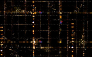 Dark lights blurs cityscape fireworks - a pattern of circles free wallpaper